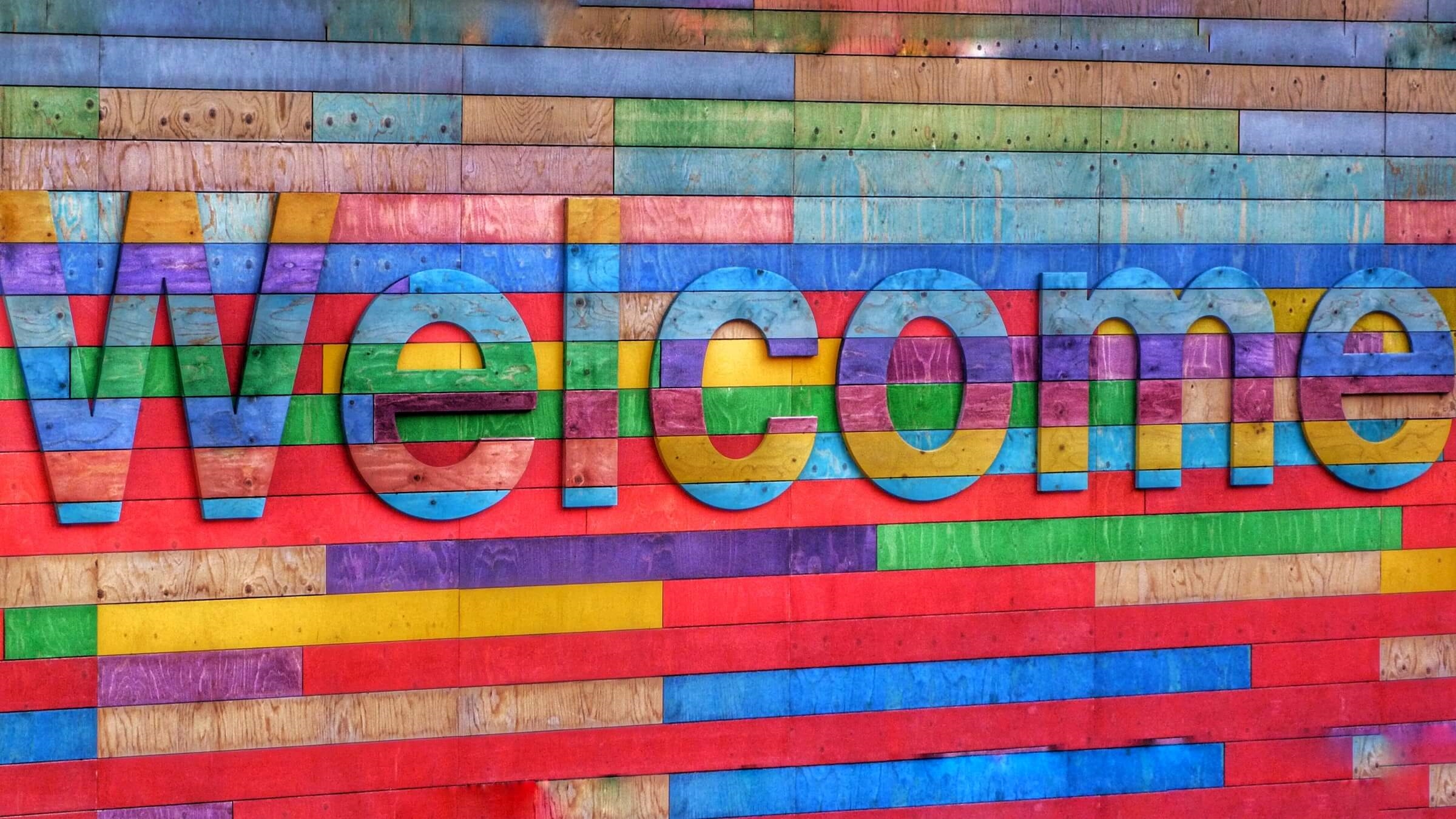 A welcome sign in bright colours
